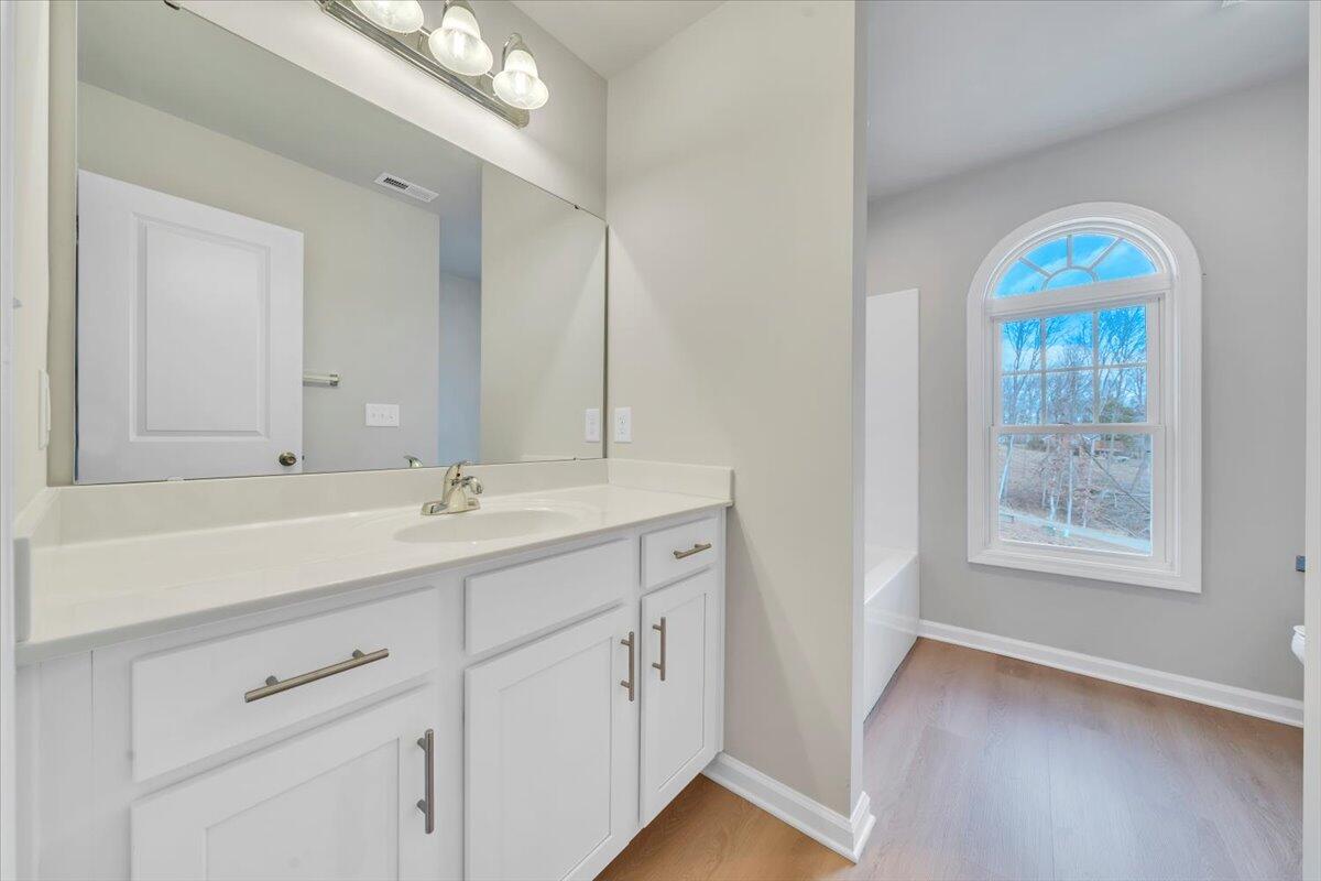 3711 Crescent Ridge Drive Southwest Roanoke, VA 24015 - Photo 16 of 23 a bathroom with 2 sink and a mirror