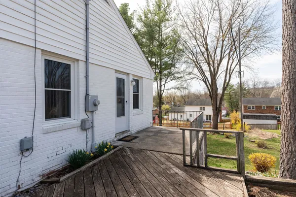 a view of a deck with a wooden fence