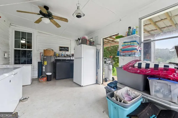 a bed room with a bed and a window