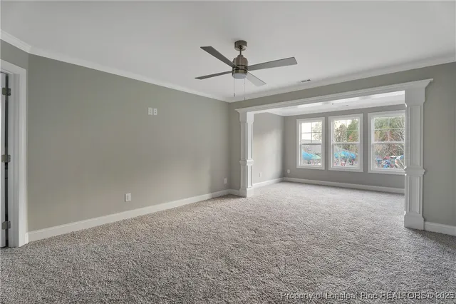 a bathroom with double vanity sinks a toilet and a bathtub