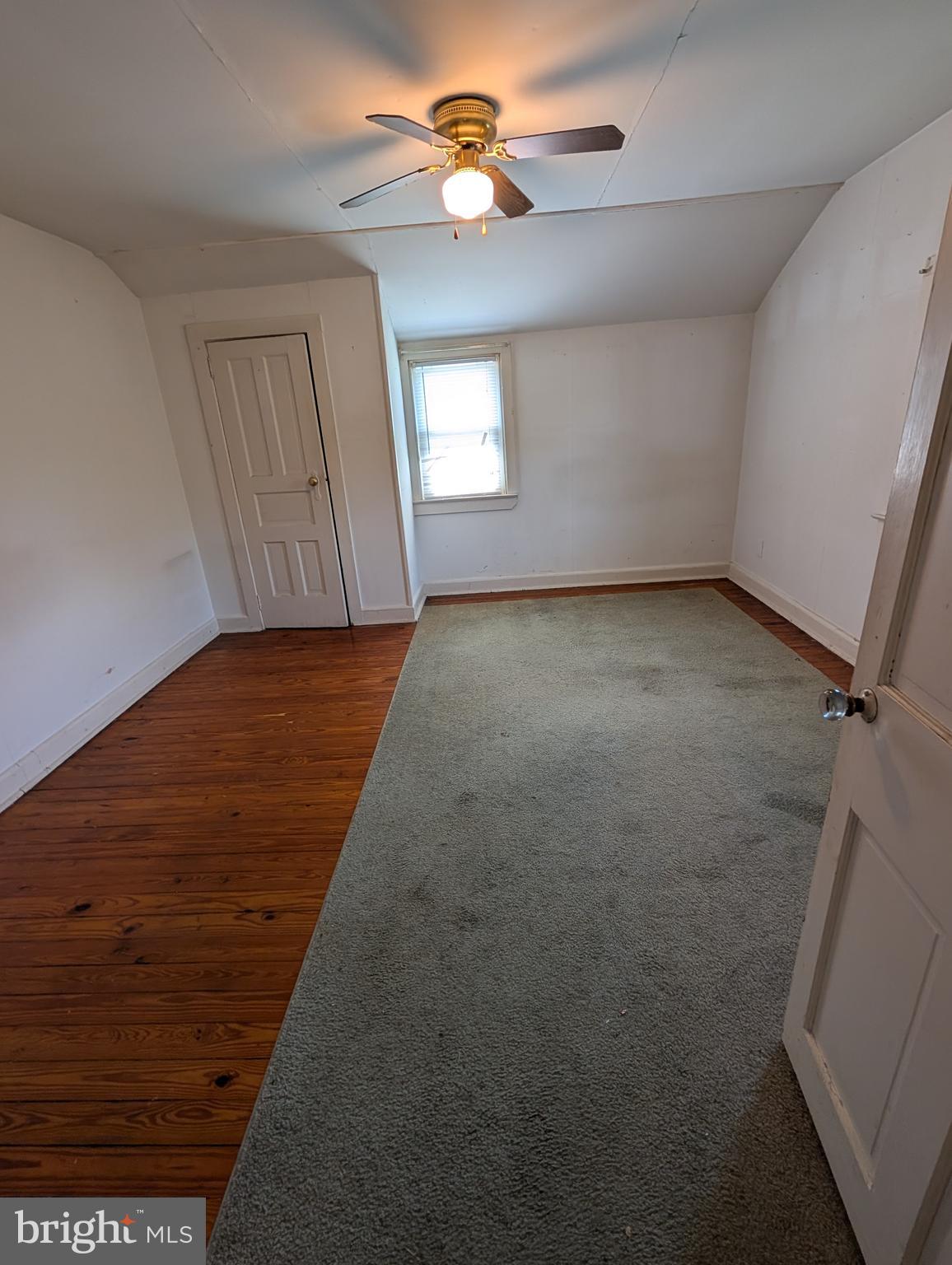 1988 Valley Road Parkesburg, PA 19365 - Photo 9 of 14 an empty room with windows and fan