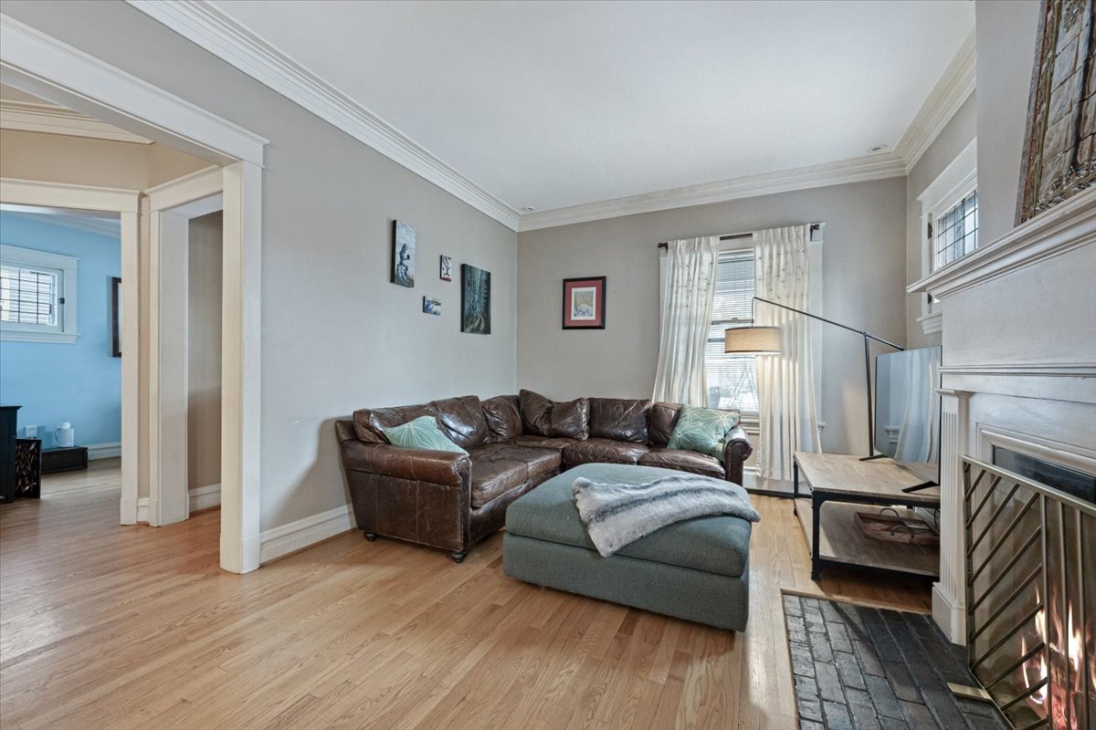 233 South Ridgeland Avenue Oak Park, IL 60302 - Photo 11 of 20 a living room with furniture and a fireplace