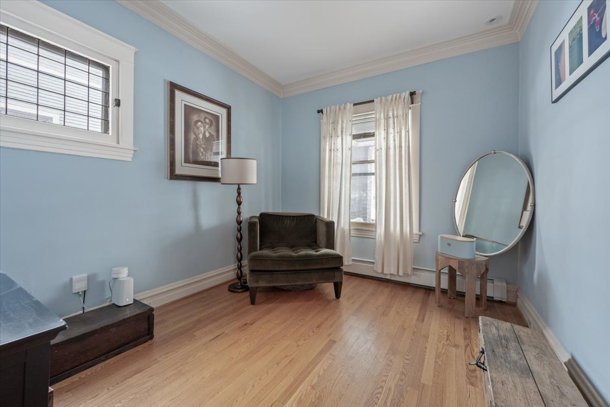 233 South Ridgeland Avenue Oak Park, IL 60302 - Photo 14 of 20 a living room with furniture and a wooden floor