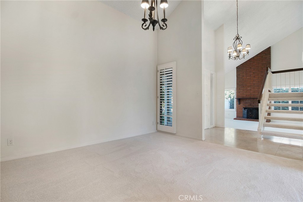 3808 Mistral Drive Huntington Beach, CA 92649 - Photo 11 of 28 wooden floor in an empty room with a window