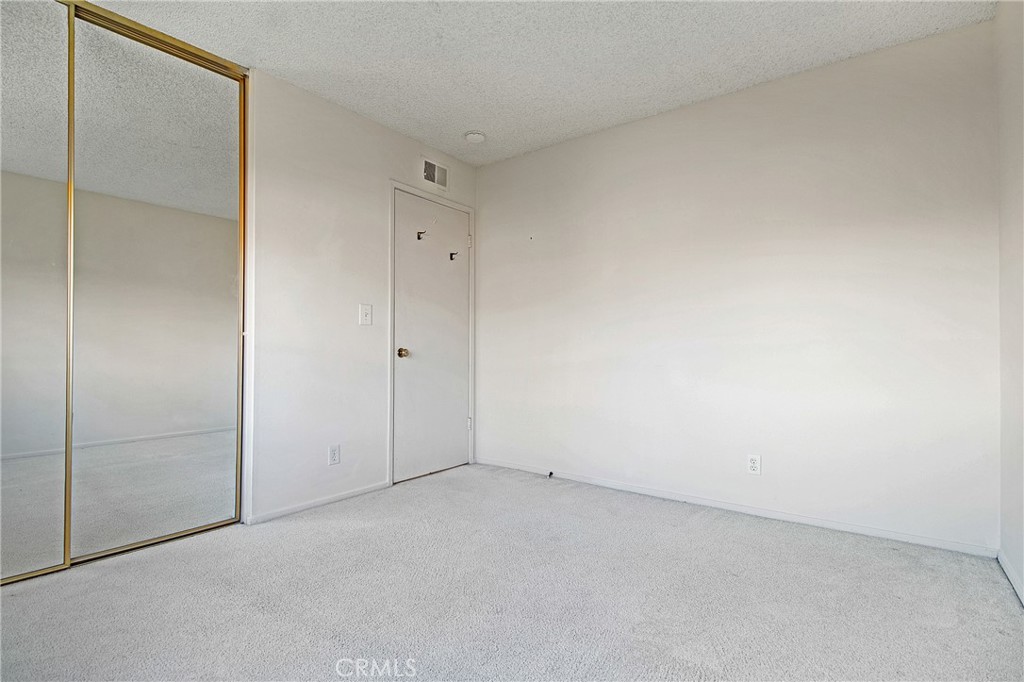 3808 Mistral Drive Huntington Beach, CA 92649 - Photo 15 of 28 an empty room with closet area