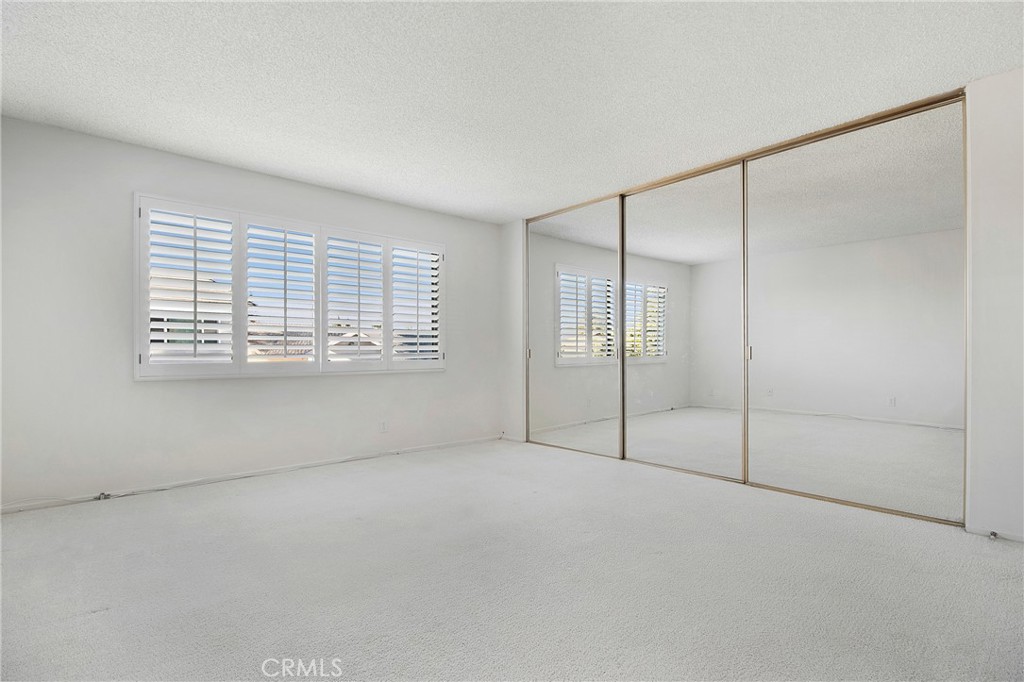 3808 Mistral Drive Huntington Beach, CA 92649 - Photo 18 of 28 an empty room with windows and closet