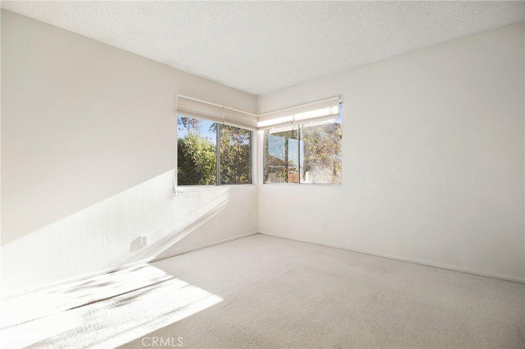 3808 Mistral Drive Huntington Beach, CA 92649 - Photo 20 of 28 an empty room with windows