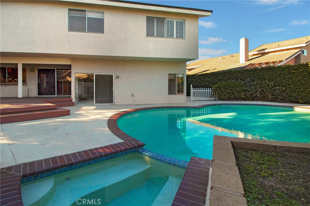 3808 Mistral Drive Huntington Beach, CA 92649 - Photo 24 of 28 a view of a house with pool
