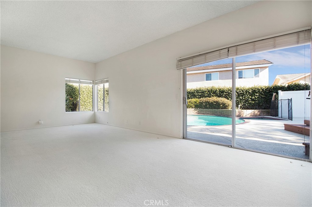 3808 Mistral Drive Huntington Beach, CA 92649 - Photo 6 of 28 a view of a room with a large window