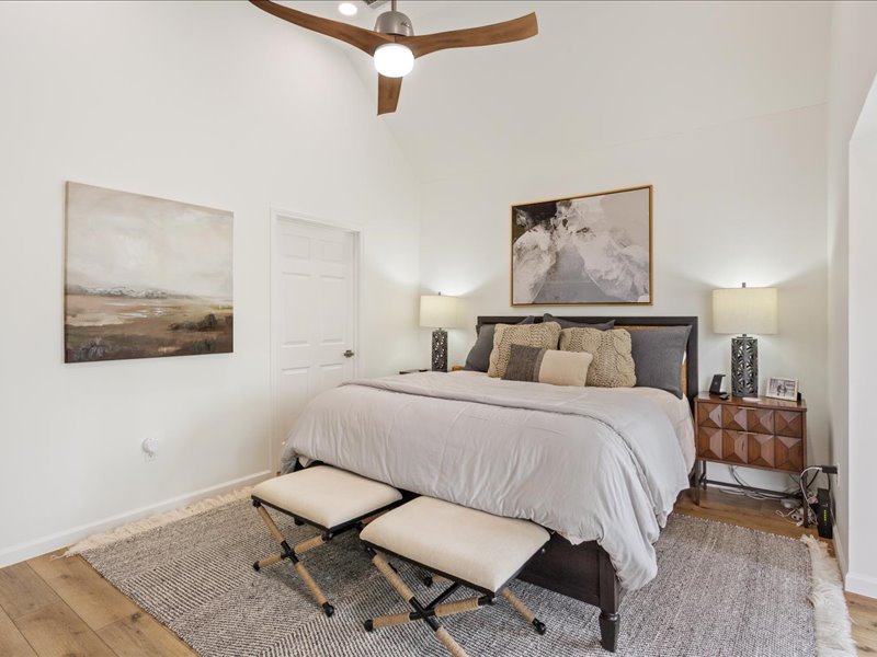 1205 South Main Street Georgetown, TX 78626 - Photo 14 of 35 a bedroom with a bed and chair