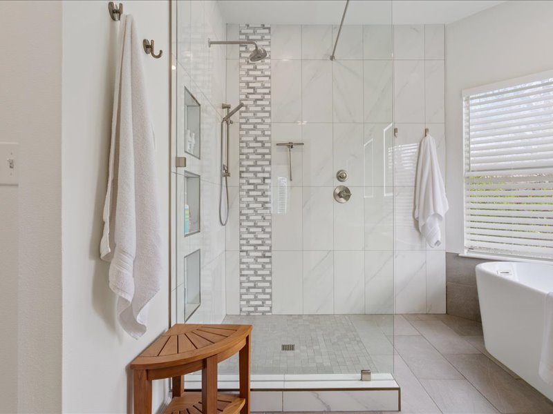 1205 South Main Street Georgetown, TX 78626 - Photo 17 of 35 a bathroom with a shower