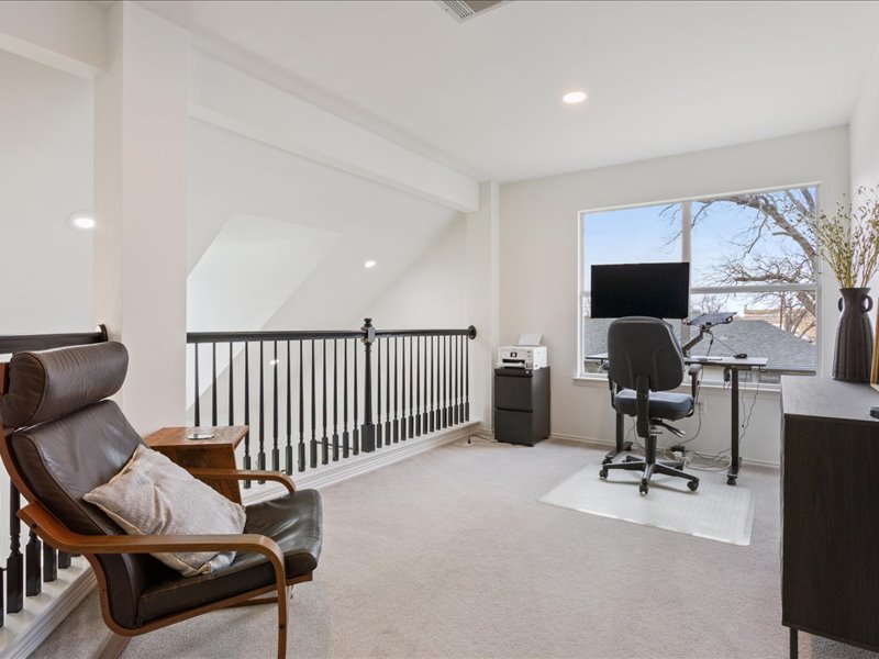 1205 South Main Street Georgetown, TX 78626 - Photo 19 of 35 a view of a workspace with furniture and a window