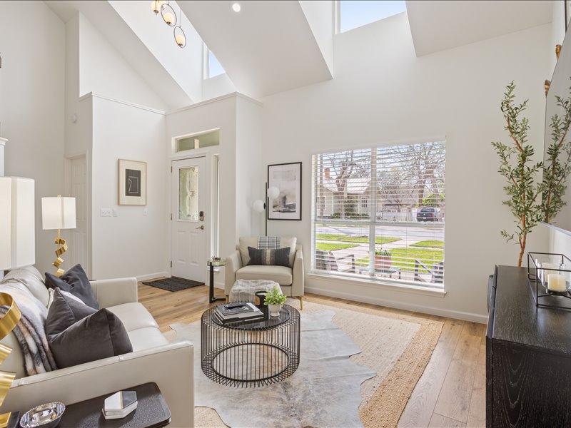 1205 South Main Street Georgetown, TX 78626 - Photo 2 of 35 a living room with furniture and a floor to ceiling window