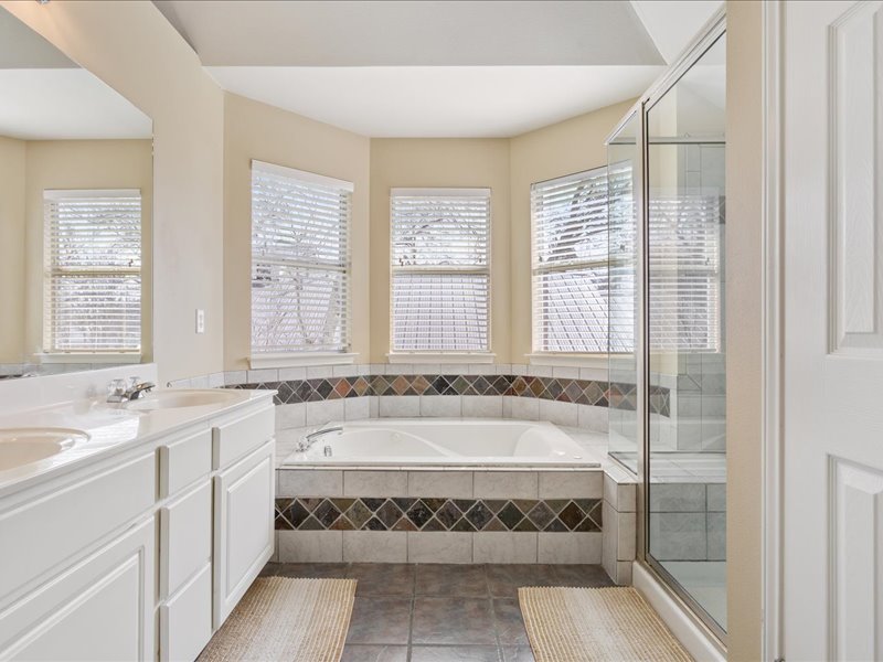 1205 South Main Street Georgetown, TX 78626 - Photo 21 of 35 a spacious bathroom with a tub and a sink