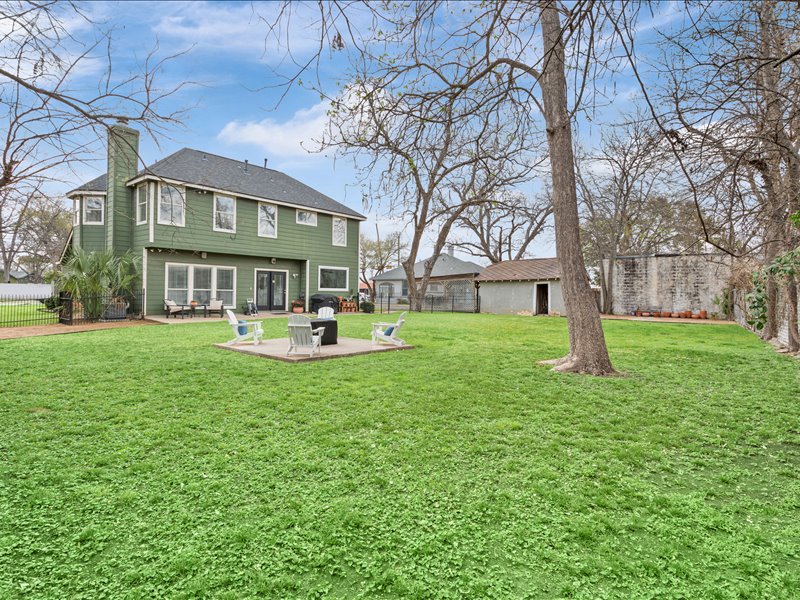 1205 South Main Street Georgetown, TX 78626 - Photo 29 of 35 a front view of a house with garden and trees