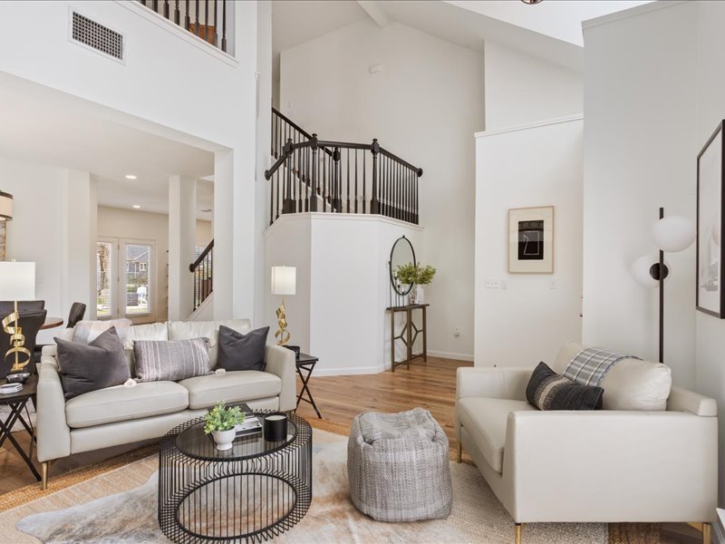 1205 South Main Street Georgetown, TX 78626 - Photo 4 of 35 a living room with furniture and a rug