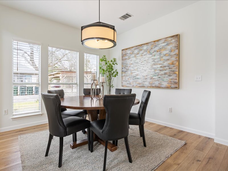 1205 South Main Street Georgetown, TX 78626 - Photo 5 of 35 a view of a dining room with furniture window and wooden floor