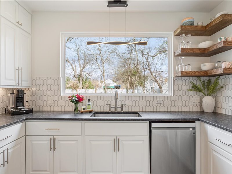 1205 South Main Street Georgetown, TX 78626 - Photo 9 of 35 a kitchen with a sink and a large window