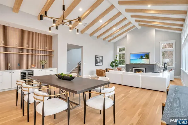a bathroom with a sink mirror vanity and toilet