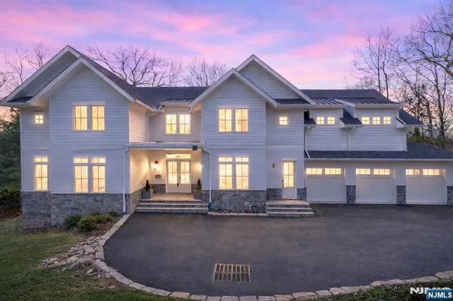 a large bedroom with a bed and a window