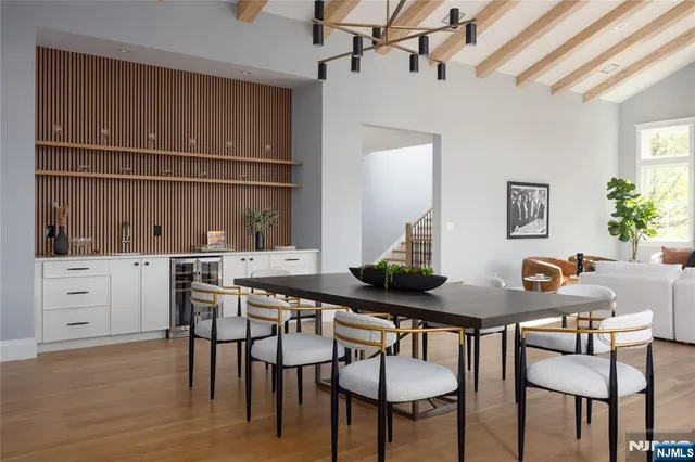 a kitchen with a table and chairs in it