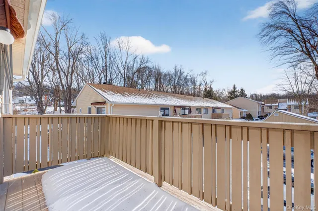 a view of a wooden roof deck