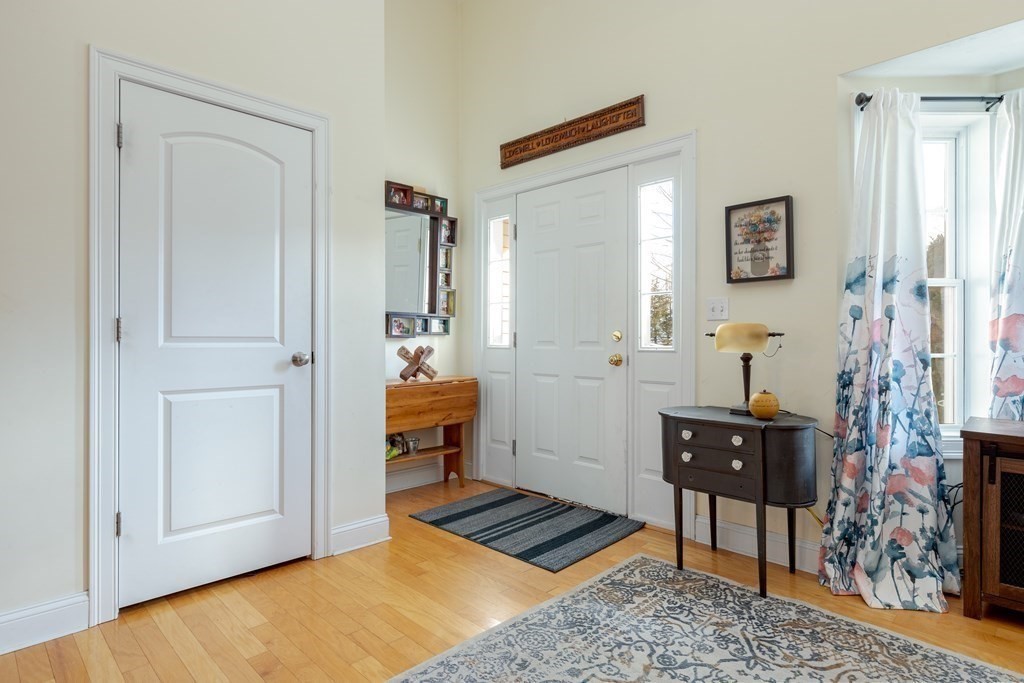 2 Charles Ridge Road, Unit D Littleton, MA 01460 - Photo 4 of 30 a view of room with furniture and wooden floor