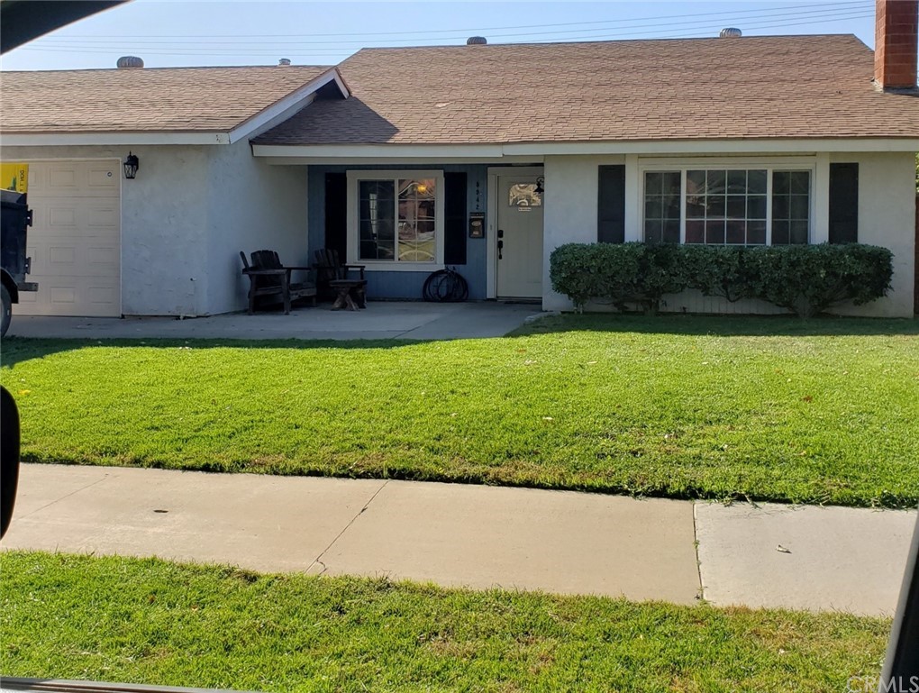 5942 Green Valley Road Riverside, CA 92504 - Photo 1 of 1 a front view of a house with garden