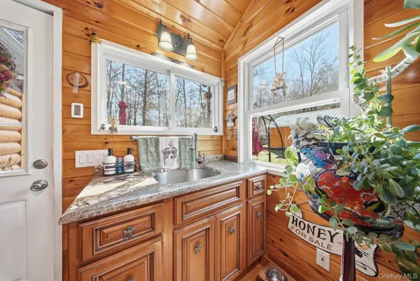 a kitchen with stainless steel appliances granite countertop a stove and a sink