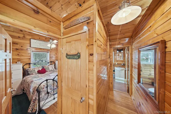 a bed room with a bed and a chandelier