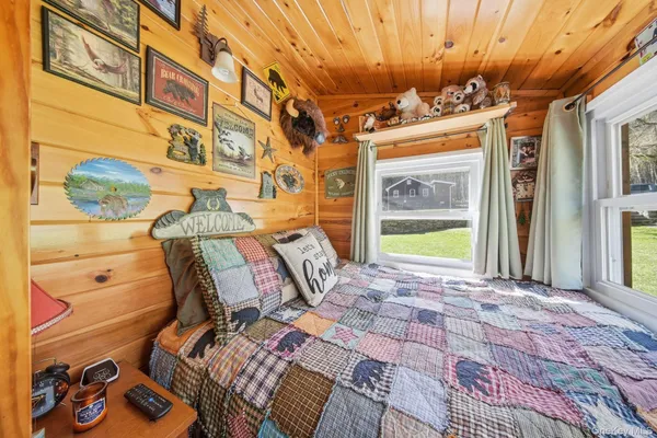 a view of a patio with a table and chairs
