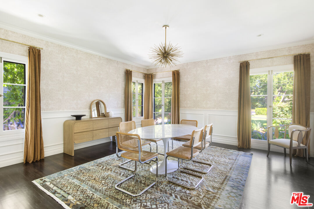 1095 Armada Drive Pasadena, CA 91103 - Photo 8 of 47 a view of a dining room with furniture window and wooden floor