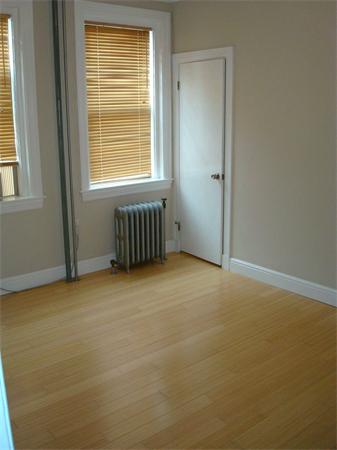 6 Sutherland Road, Unit 2 Boston, MA 02135 - Photo 4 of 9 a view of an empty room with a window