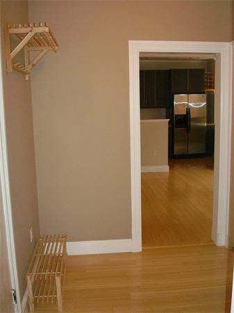 6 Sutherland Road, Unit 2 Boston, MA 02135 - Photo 5 of 9 a view of a hardwood & utility room