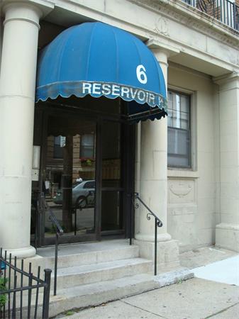 6 Sutherland Road, Unit 2 Boston, MA 02135 - Photo 8 of 9 a front view of a building with retail shop