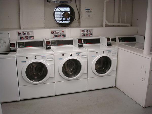 6 Sutherland Road, Unit 2 Boston, MA 02135 - Photo 9 of 9 a utility room with dryer and washer