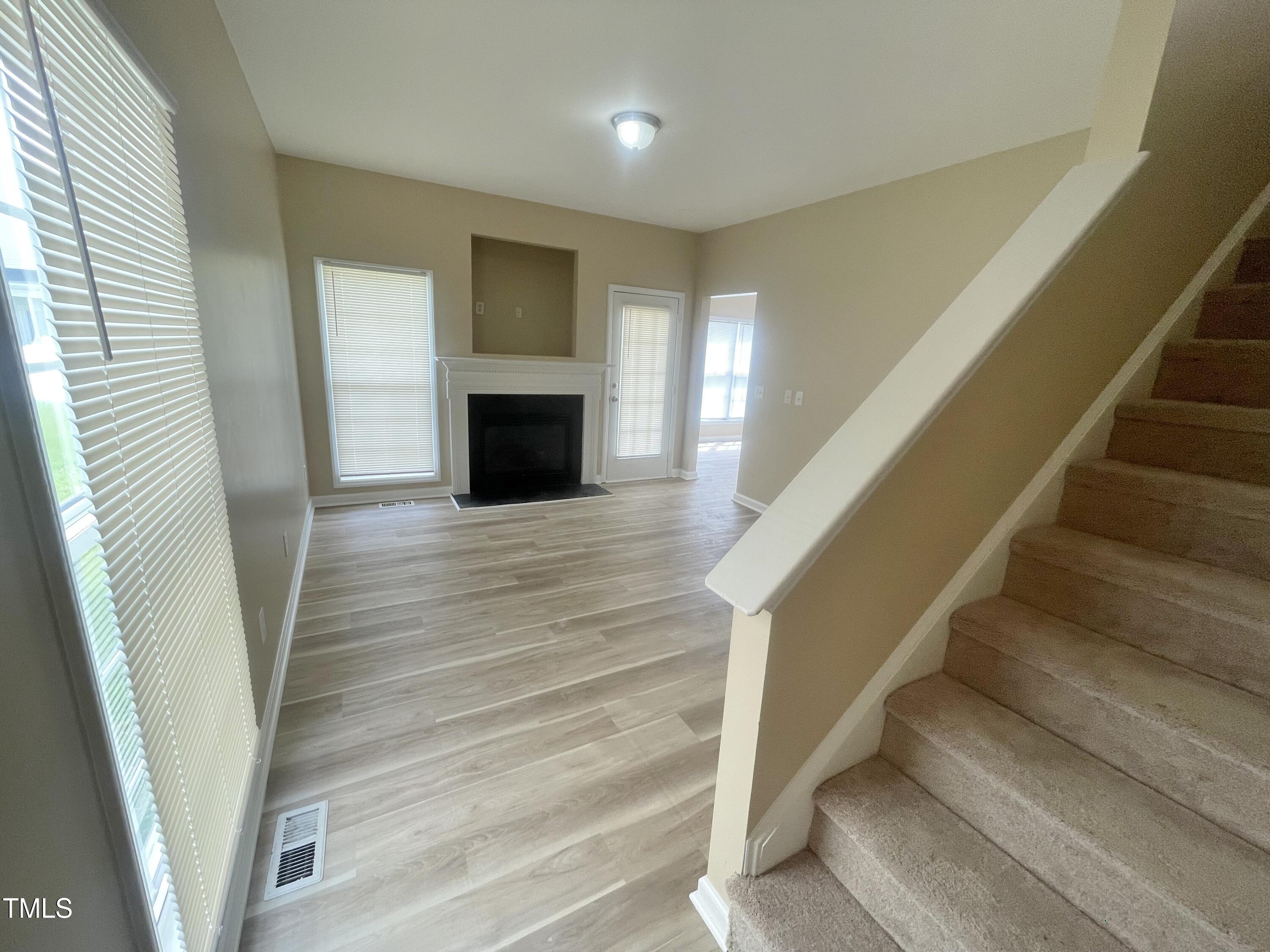4212 Beacon Crest Way Raleigh, NC 27604 - Photo 3 of 31 a view of entryway and hall with wooden floor