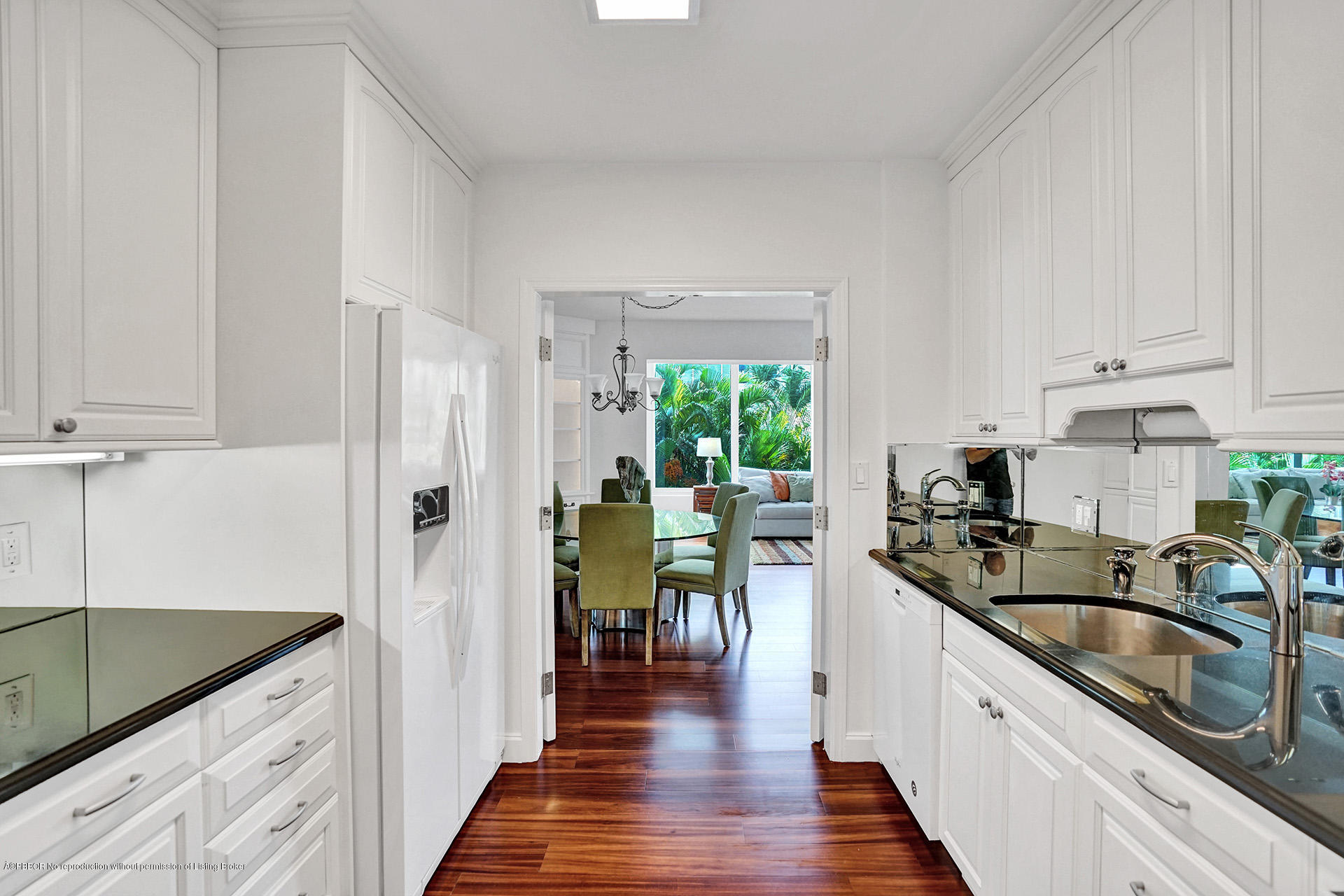44 Cocoanut Row, Unit 308A Palm Beach, FL 33480 - Photo 11 of 22 a kitchen with granite countertop lots of counter top space and stainless steel appliances