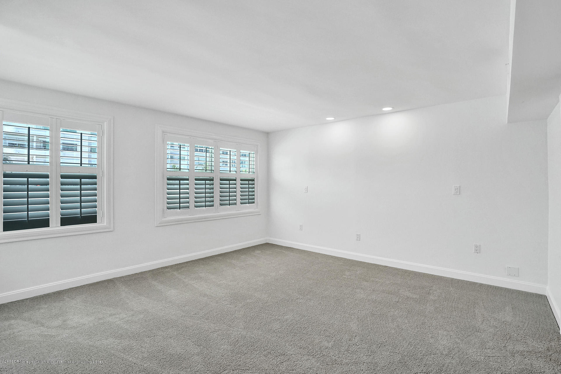 44 Cocoanut Row, Unit 308A Palm Beach, FL 33480 - Photo 13 of 22 an empty room with windows