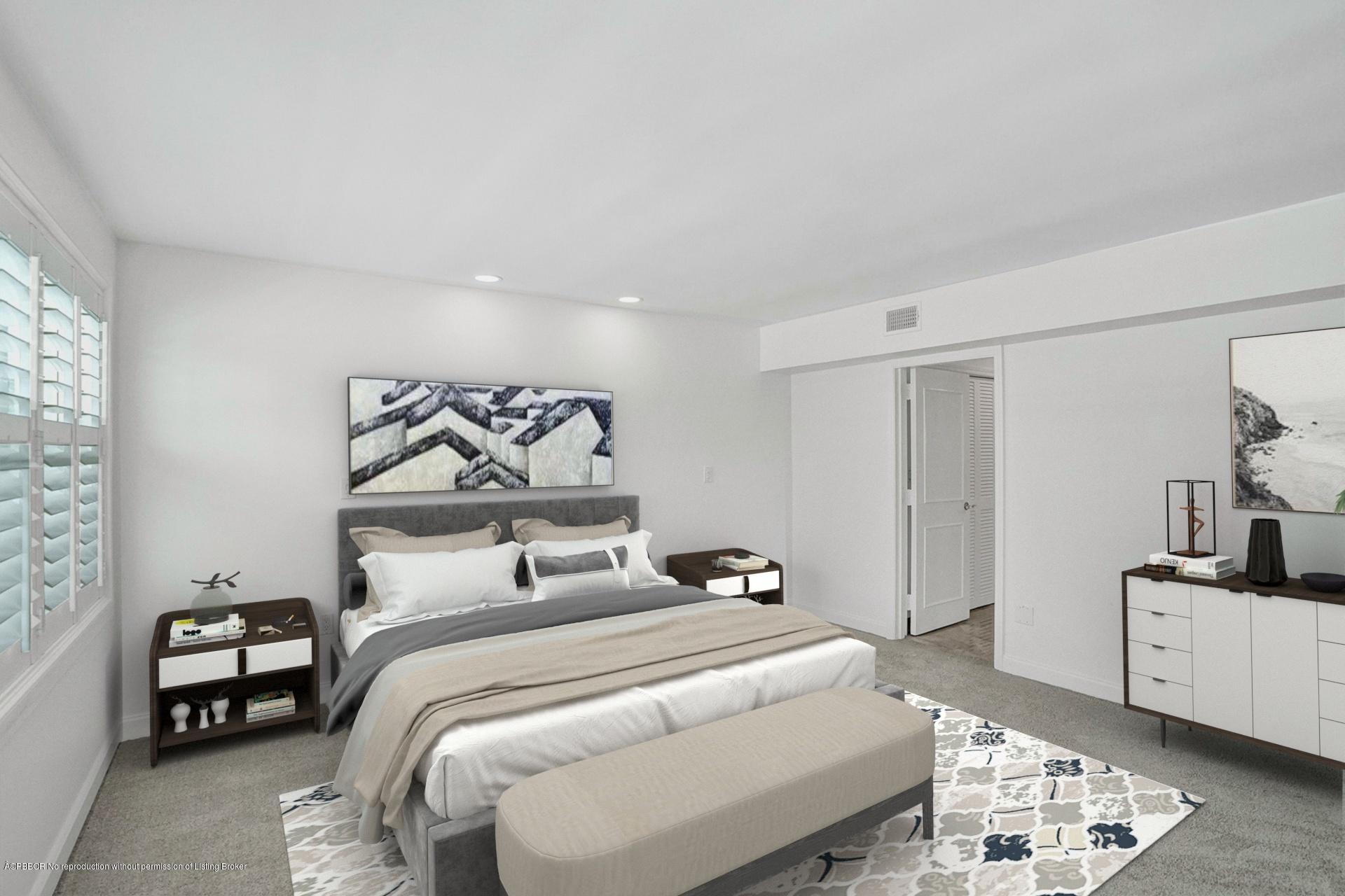 44 Cocoanut Row, Unit 308A Palm Beach, FL 33480 - Photo 17 of 22 a bedroom with a bed and wooden floor