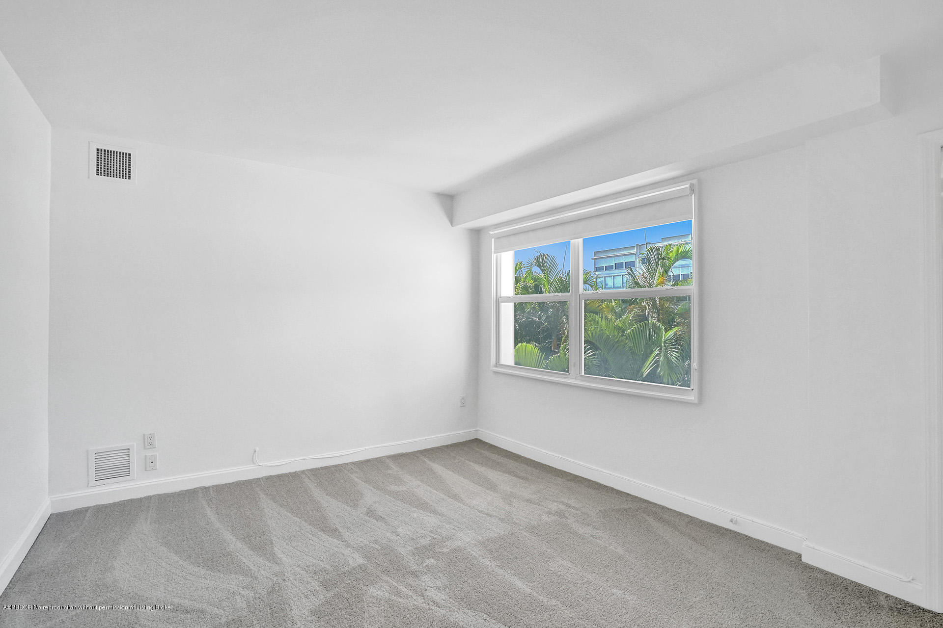 44 Cocoanut Row, Unit 308A Palm Beach, FL 33480 - Photo 20 of 22 an empty room with a window