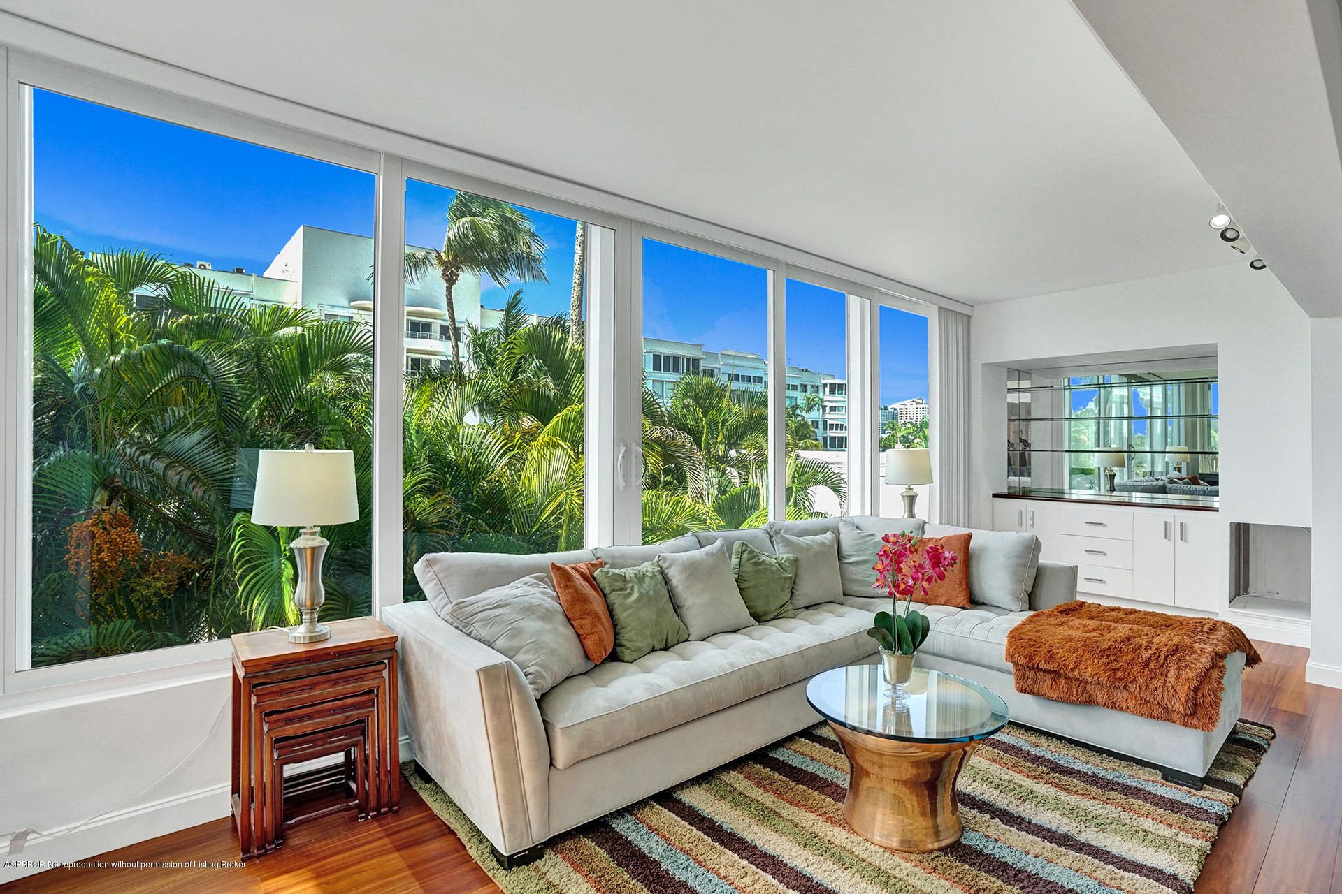 44 Cocoanut Row, Unit 308A Palm Beach, FL 33480 - Photo 4 of 22 a living room with furniture potted plant and a large window