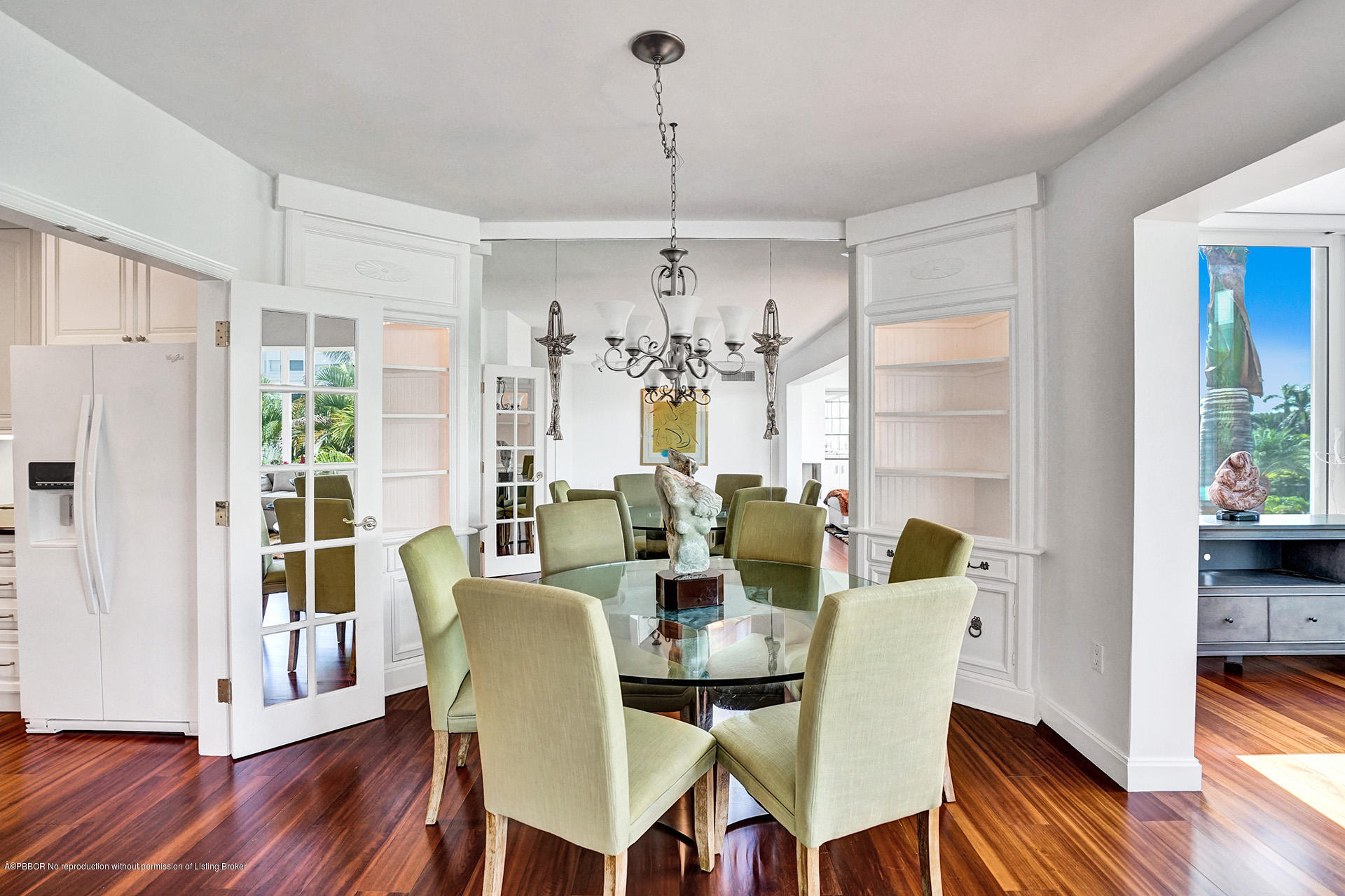 44 Cocoanut Row, Unit 308A Palm Beach, FL 33480 - Photo 8 of 22 a view of a dining room with furniture window and wooden floor
