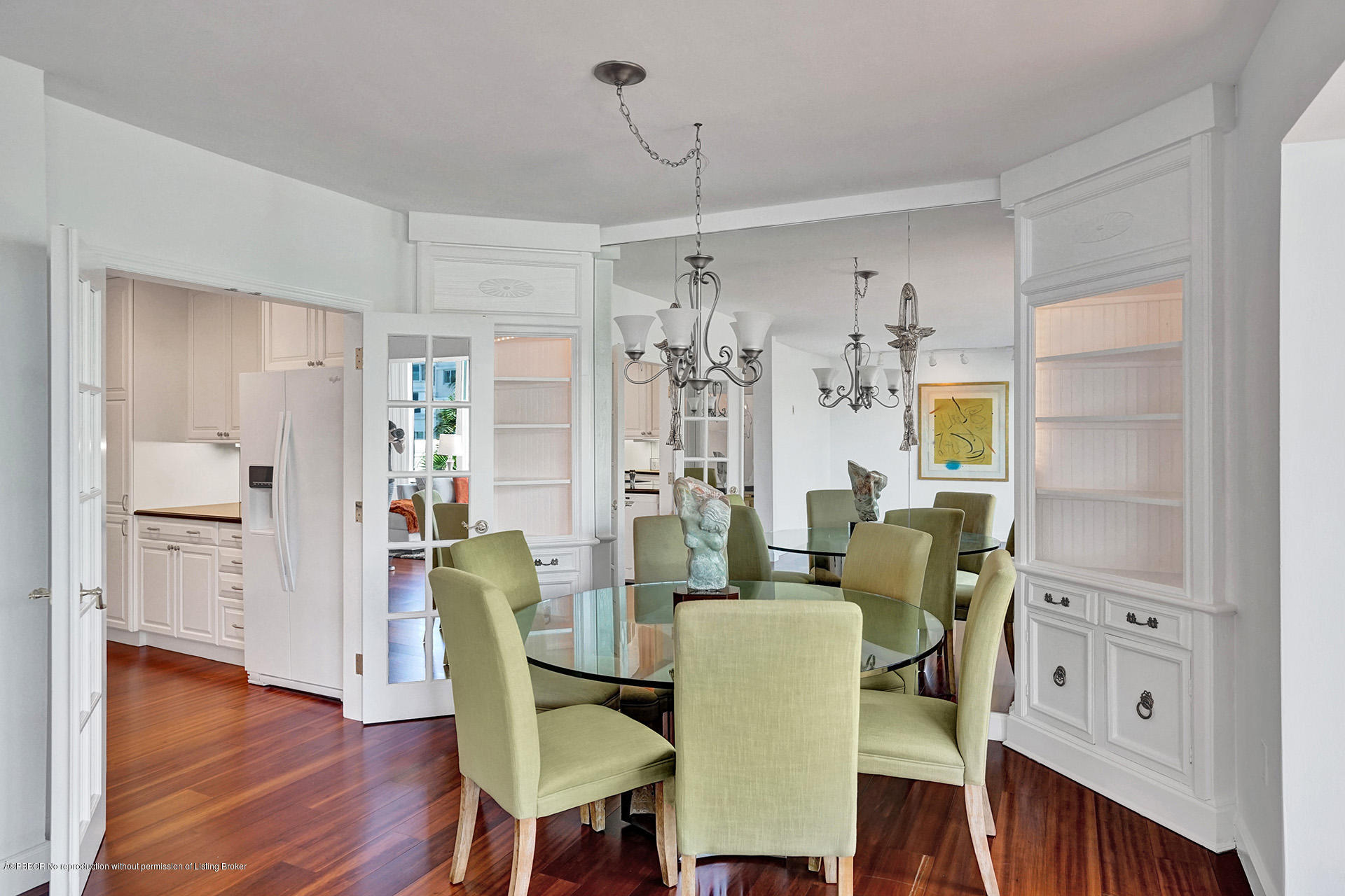 44 Cocoanut Row, Unit 308A Palm Beach, FL 33480 - Photo 9 of 22 a view of a dining room with furniture and wooden floor