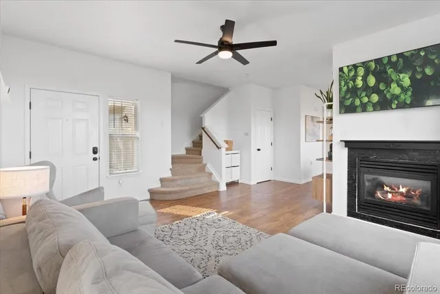 a kitchen with kitchen island a counter top space a sink and appliances