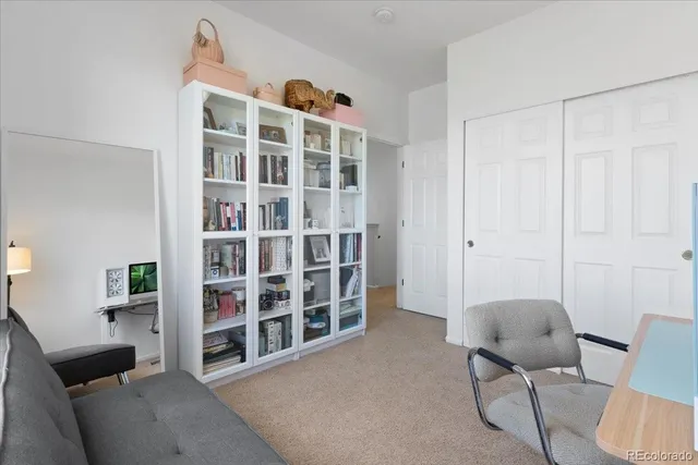 a bathroom with a sink toilet and a mirror