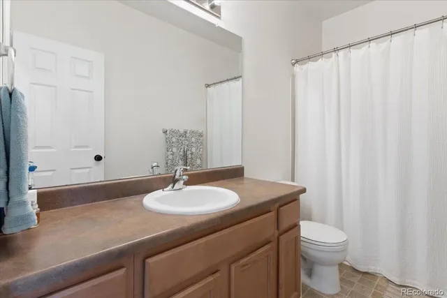 a workspace with furniture and a window