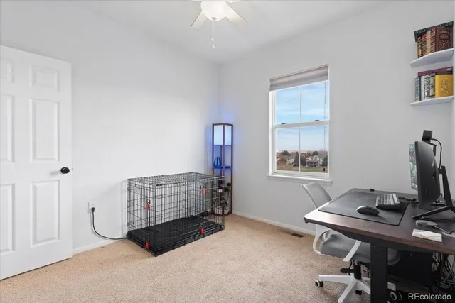 a view of a house with swimming pool and sitting area