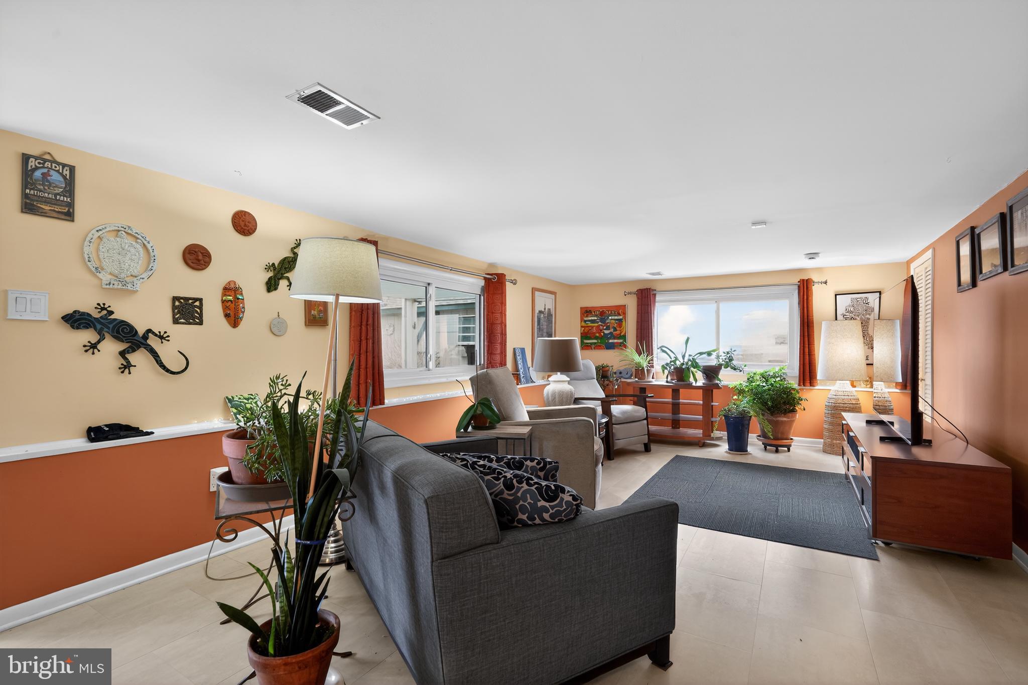1001 Rydal Road Cherry Hill, NJ 08034 - Photo 14 of 47 a living room with furniture potted plant and a large window