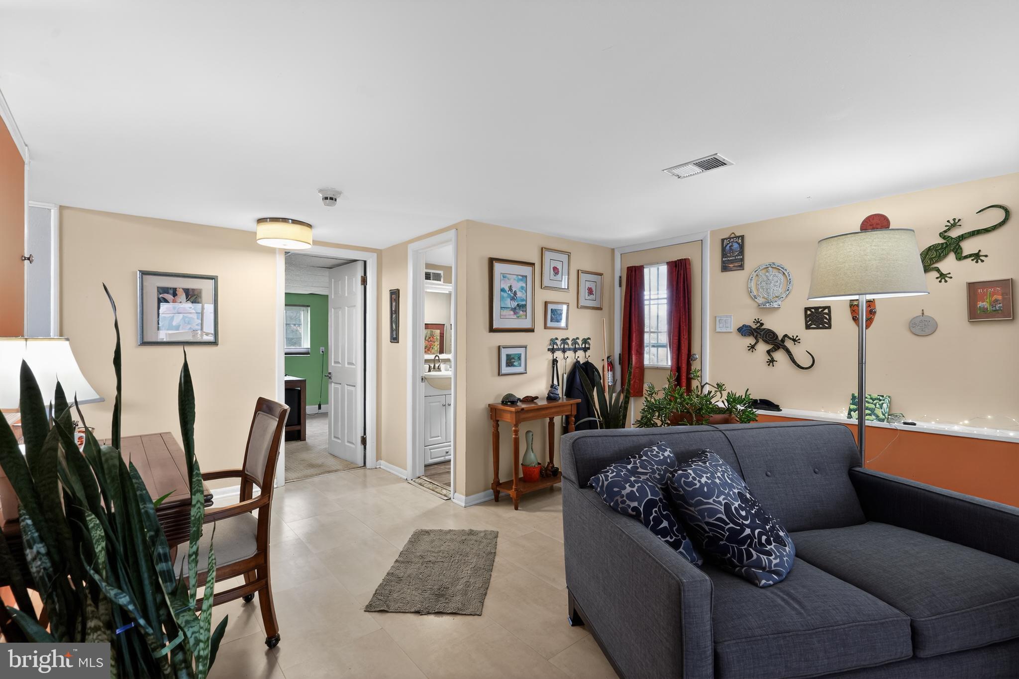 1001 Rydal Road Cherry Hill, NJ 08034 - Photo 17 of 47 a living room with furniture rug and wooden floor